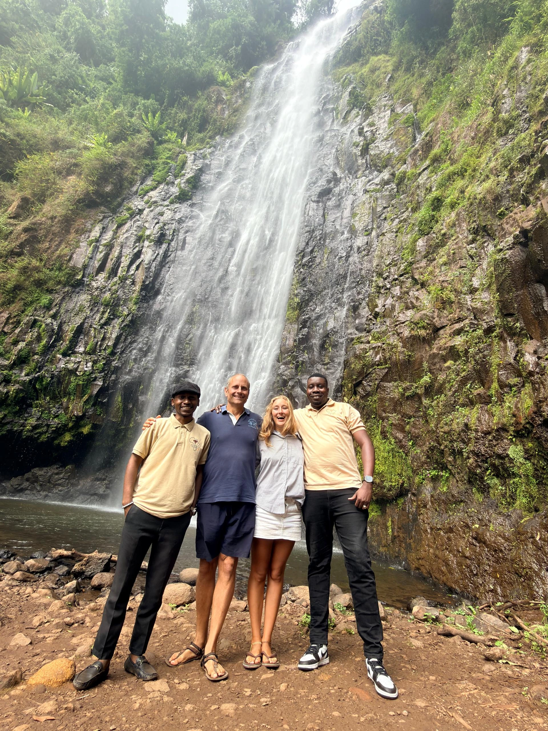Local guide with gerald's family in materuni